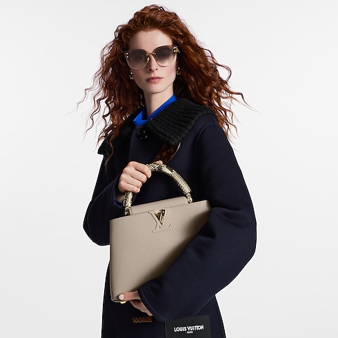 Capucines MM Python in Women's Handbags All Collections collections by Louis Vuitton (Product zoom)