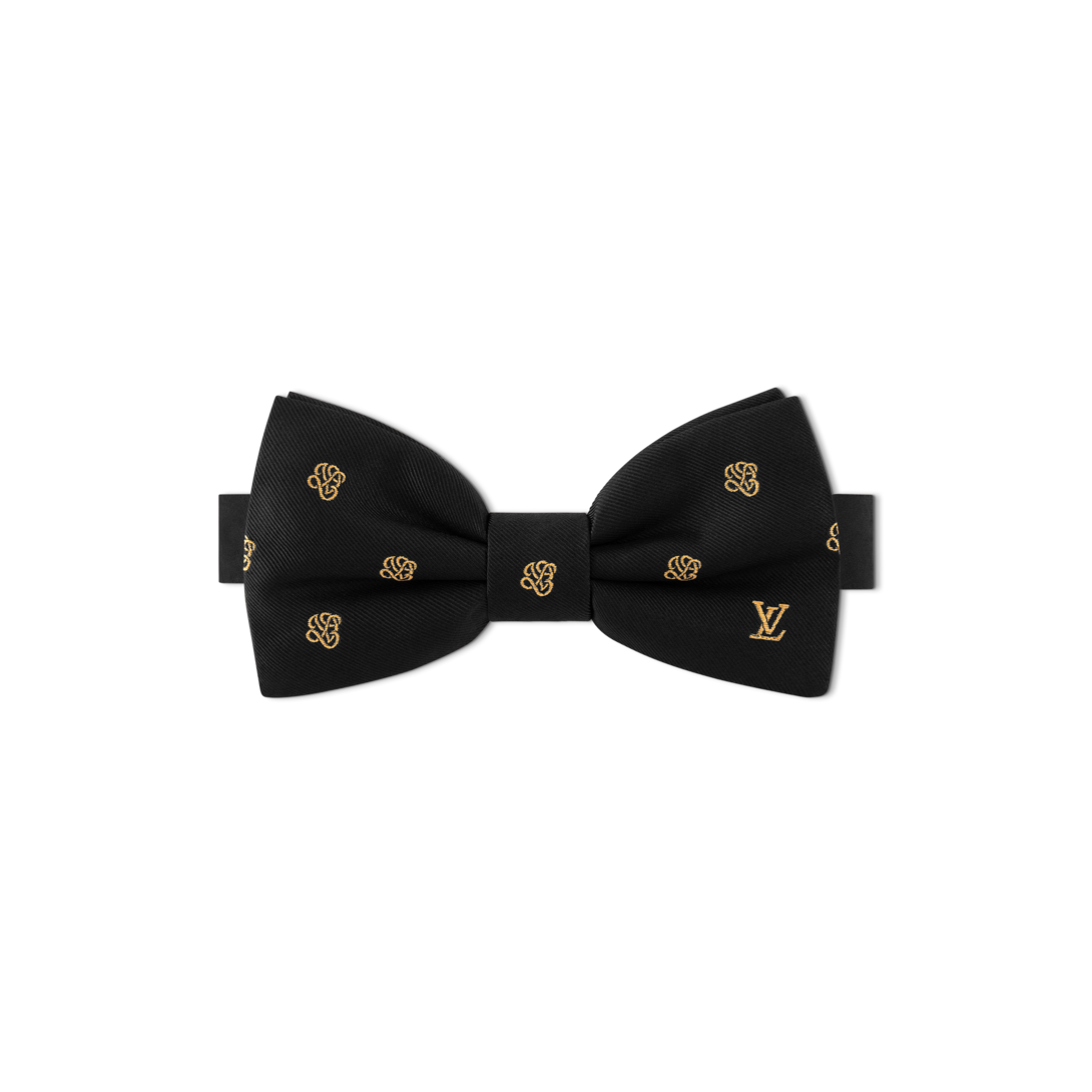 tan suit with coral tie